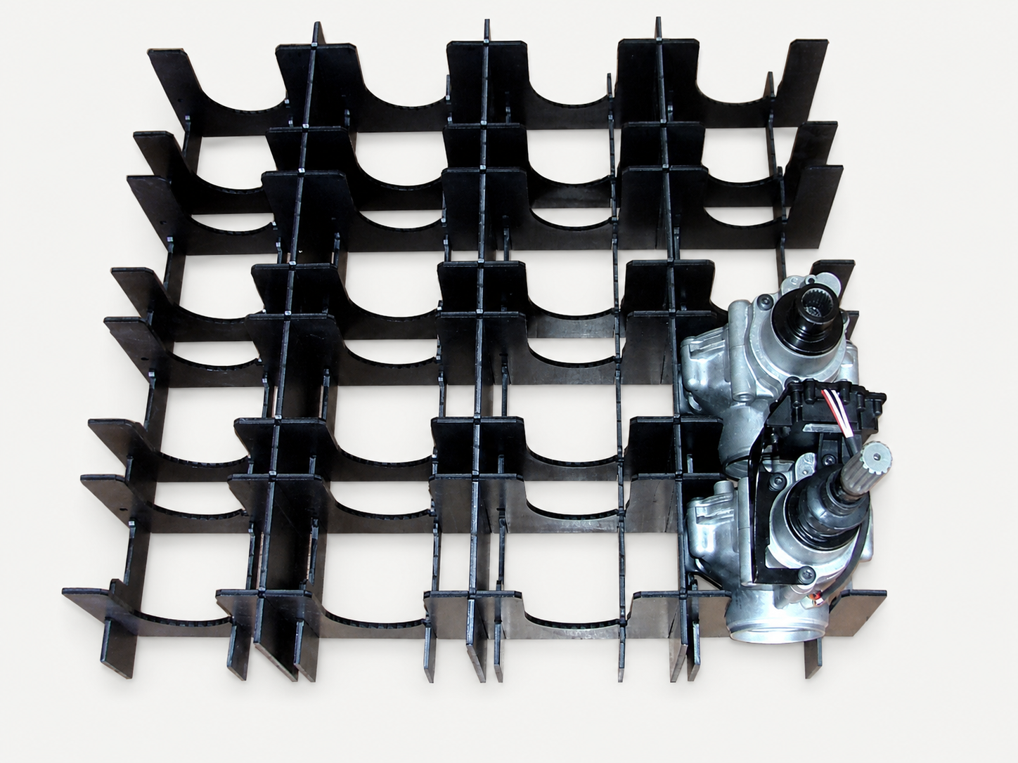 Cradle-style partition set for steering components